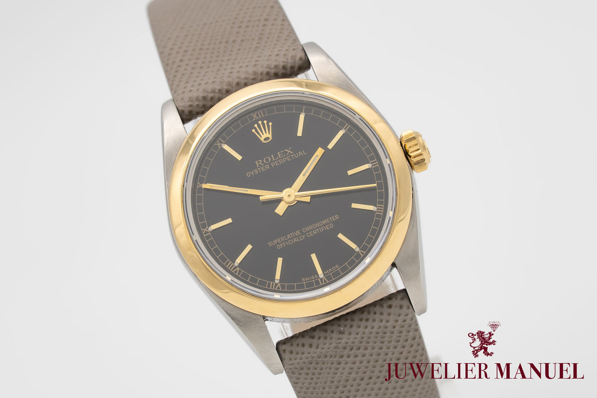 Rolex Oyster Perpetual 77483 Rolex Service Stahl Gelbgold 750 Automatik 31mm Papers