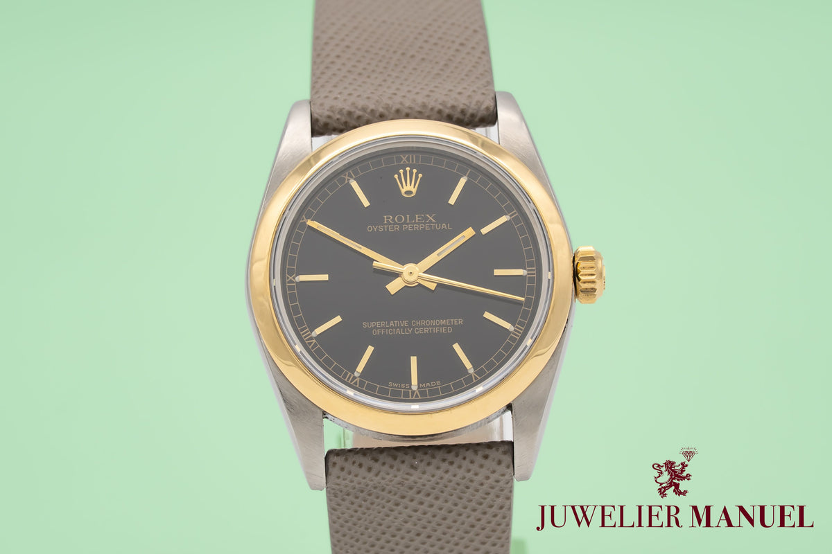 Rolex Oyster Perpetual 77483 Rolex Service Stahl Gelbgold 750 Automatik 31mm Papers