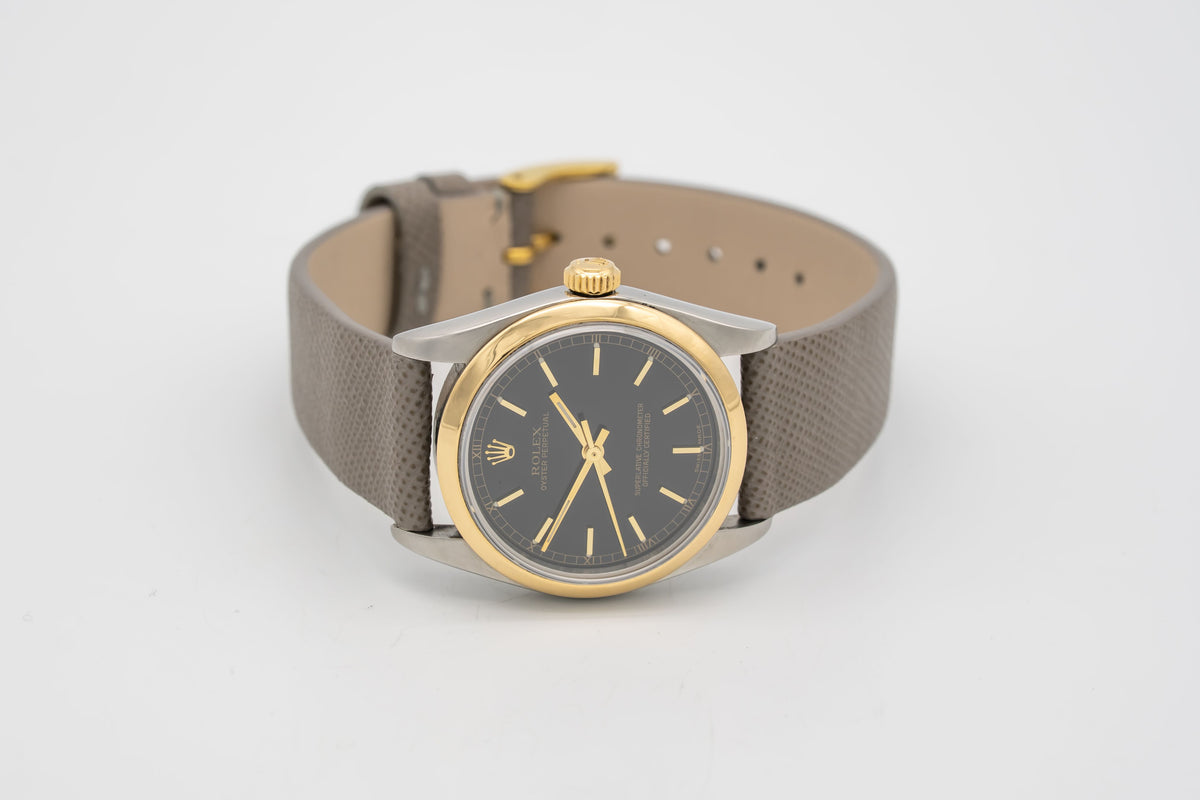 Rolex Oyster Perpetual 77483 Rolex Service Stahl Gelbgold 750 Automatik 31mm Papers