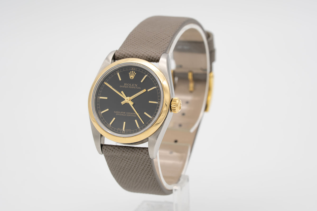 Rolex Oyster Perpetual 77483 Rolex Service Stahl Gelbgold 750 Automatik 31mm Papers