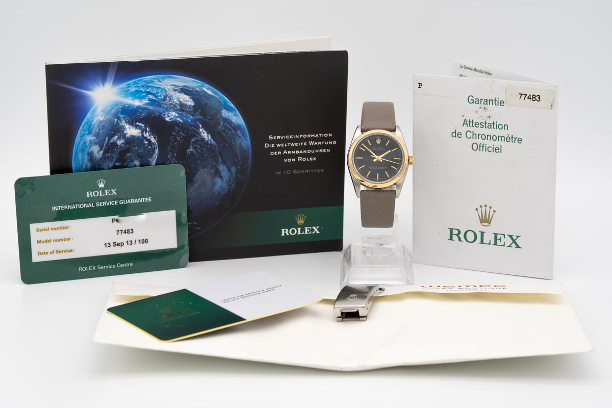Rolex Oyster Perpetual 77483 Rolex Service Stahl Gelbgold 750 Automatik 31mm Papers