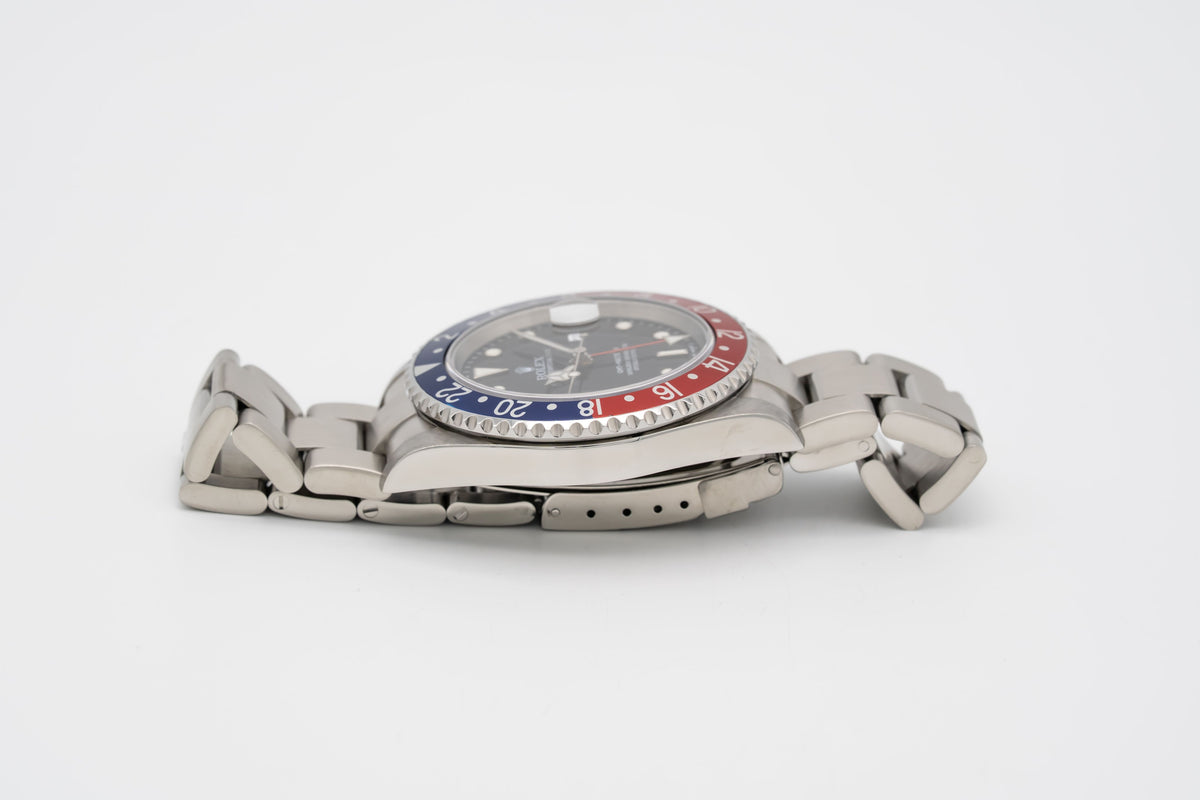 Rolex GMT-Master II 16710 Pepsi Rare Stick Dial Stahl Automatik 40mm Papers