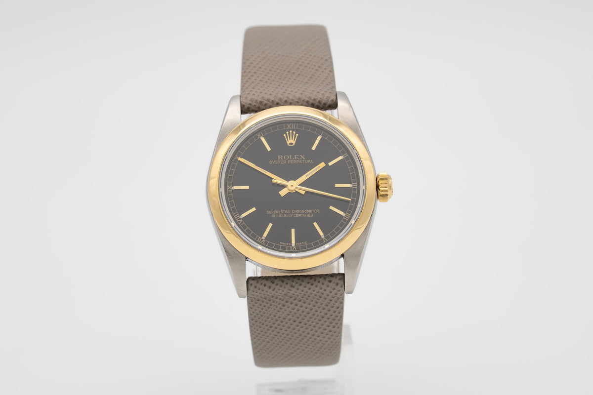 Rolex Oyster Perpetual 77483 Rolex Service Stahl Gelbgold 750 Automatik 31mm Papers