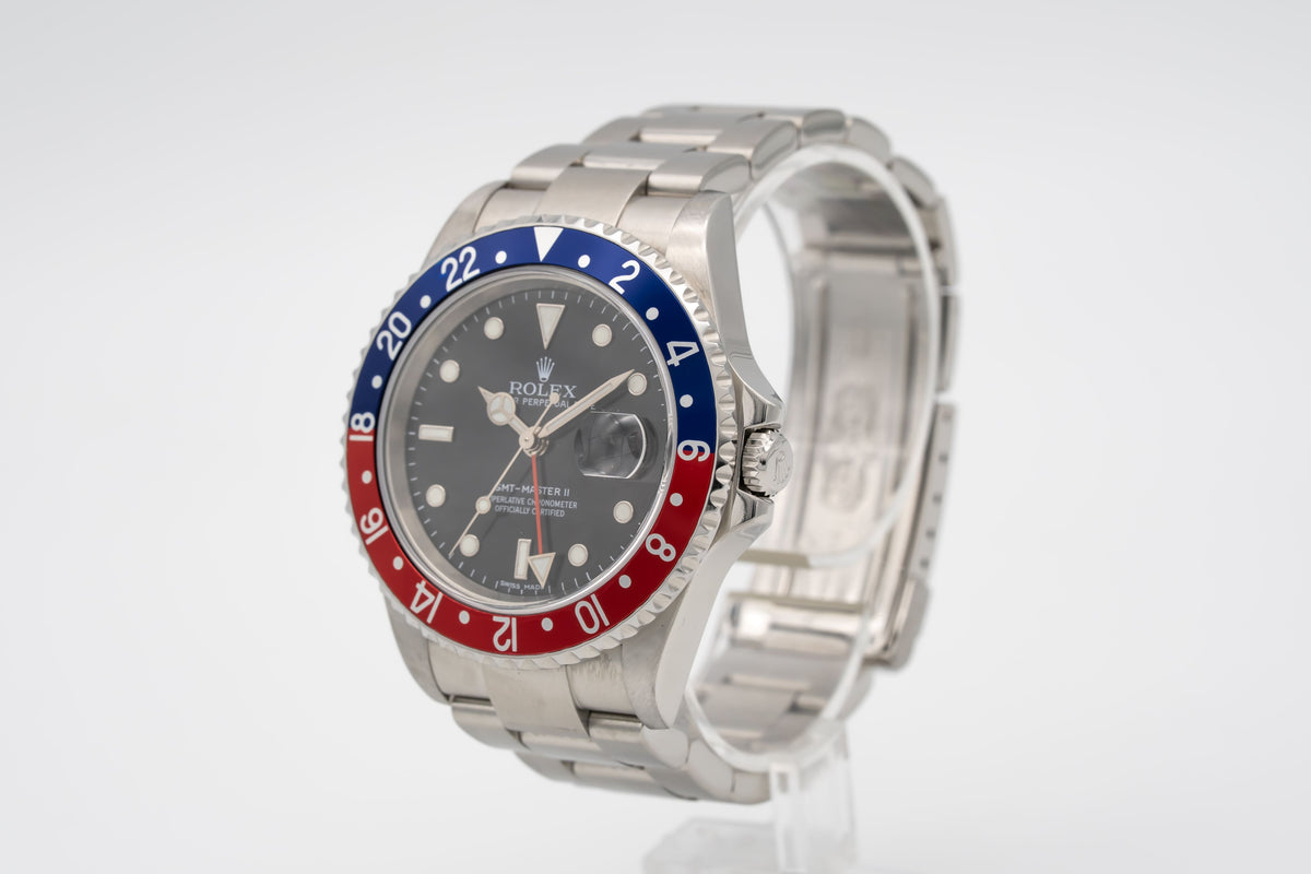 Rolex GMT-Master II 16710 Pepsi Rare Stick Dial Stahl Automatik 40mm Papers